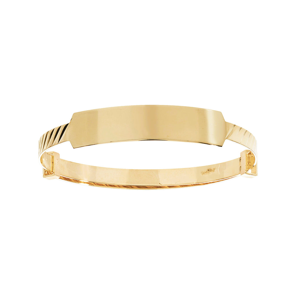 ID baby bangle with diagonal-cut pattern in yellow gold