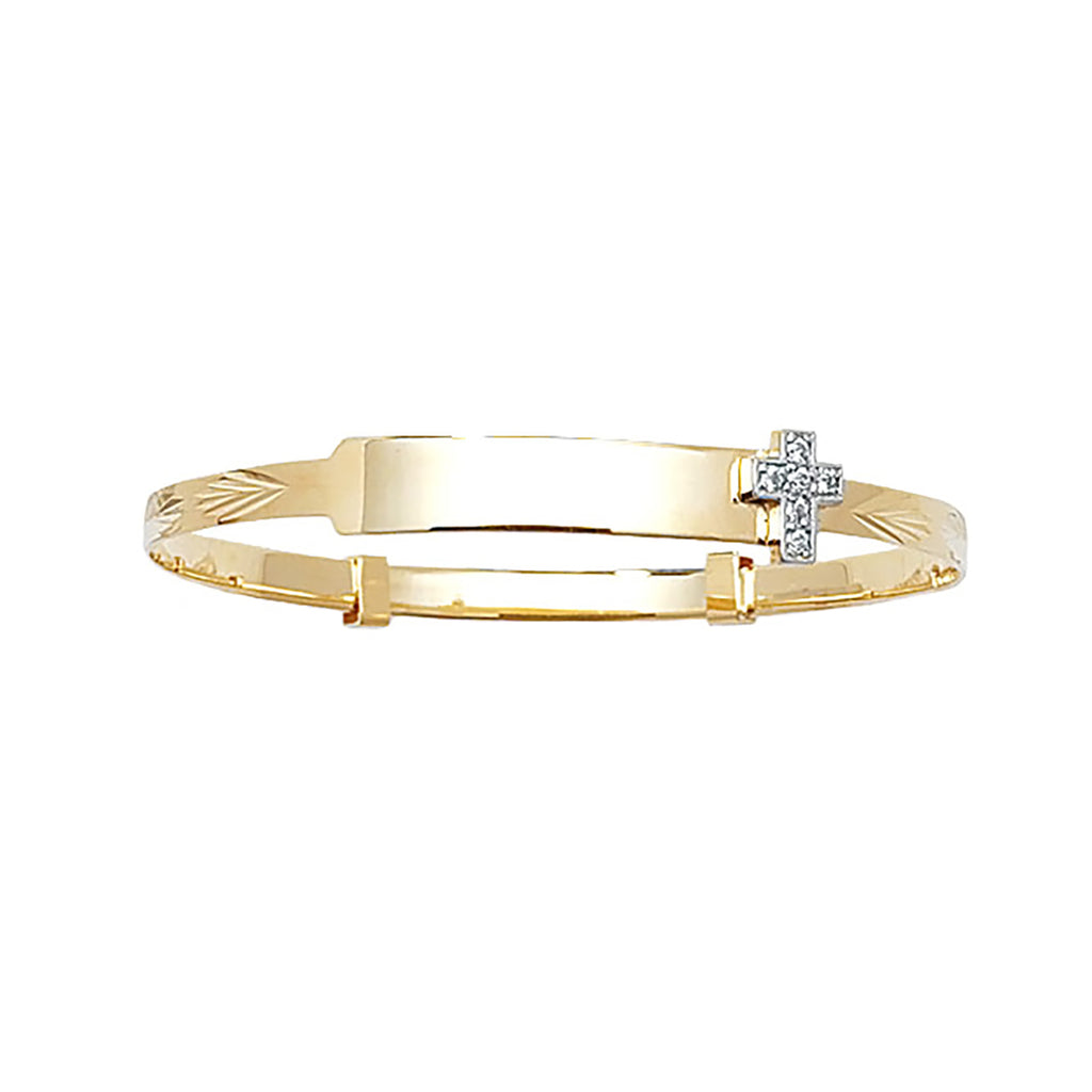 ID baby bangle with diamond cross charm in yellow gold