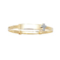 ID baby bangle with diamond cross charm in yellow gold