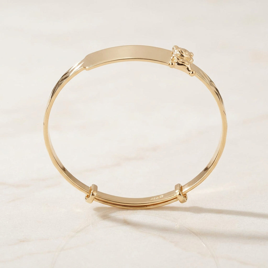 Baby ID Bangle with Teddy Bear Charm Yellow Gold